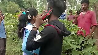 Teenage girl pounding outdoor caught by villagers